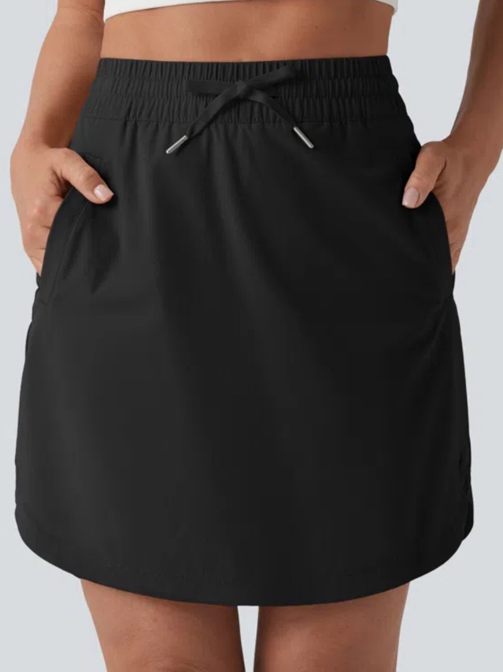 Halara High Waisted Drawstring 2-in-1 Curved Hem Mini Golf Skirt Pockets XS Long
